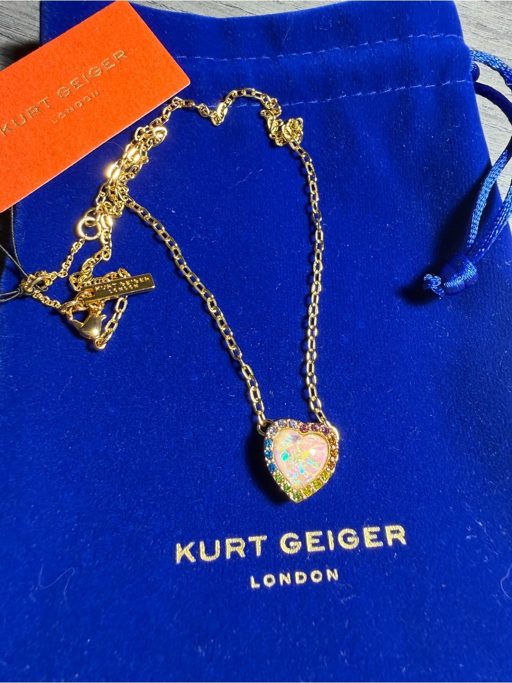 Kurt Geiger Gold Heart Necklace with Opalescent Center and Multicolor Halo